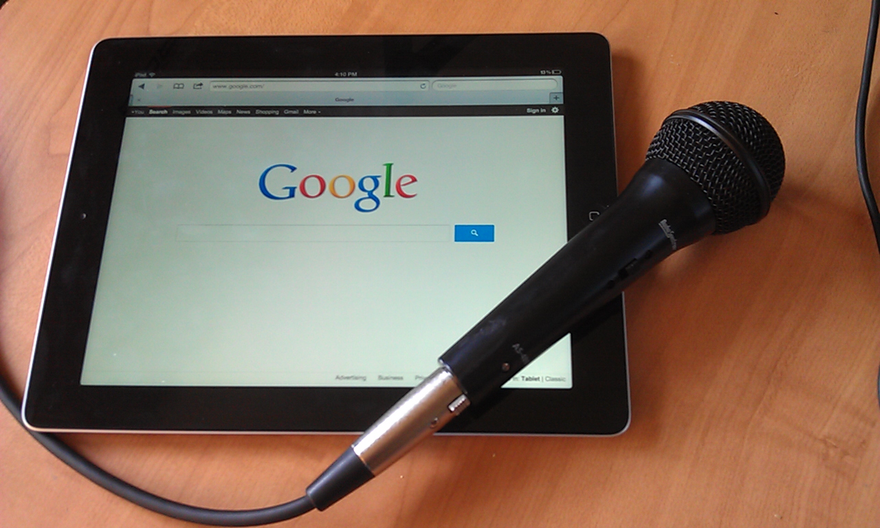 Google on iPad with podcasting mic